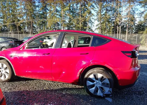 2023 Tesla Model Y Awd/Long Range Dual Motor All-Wheel Drive z USA, uszkodzony, nr VIN 7SAYGDEE1PF838577